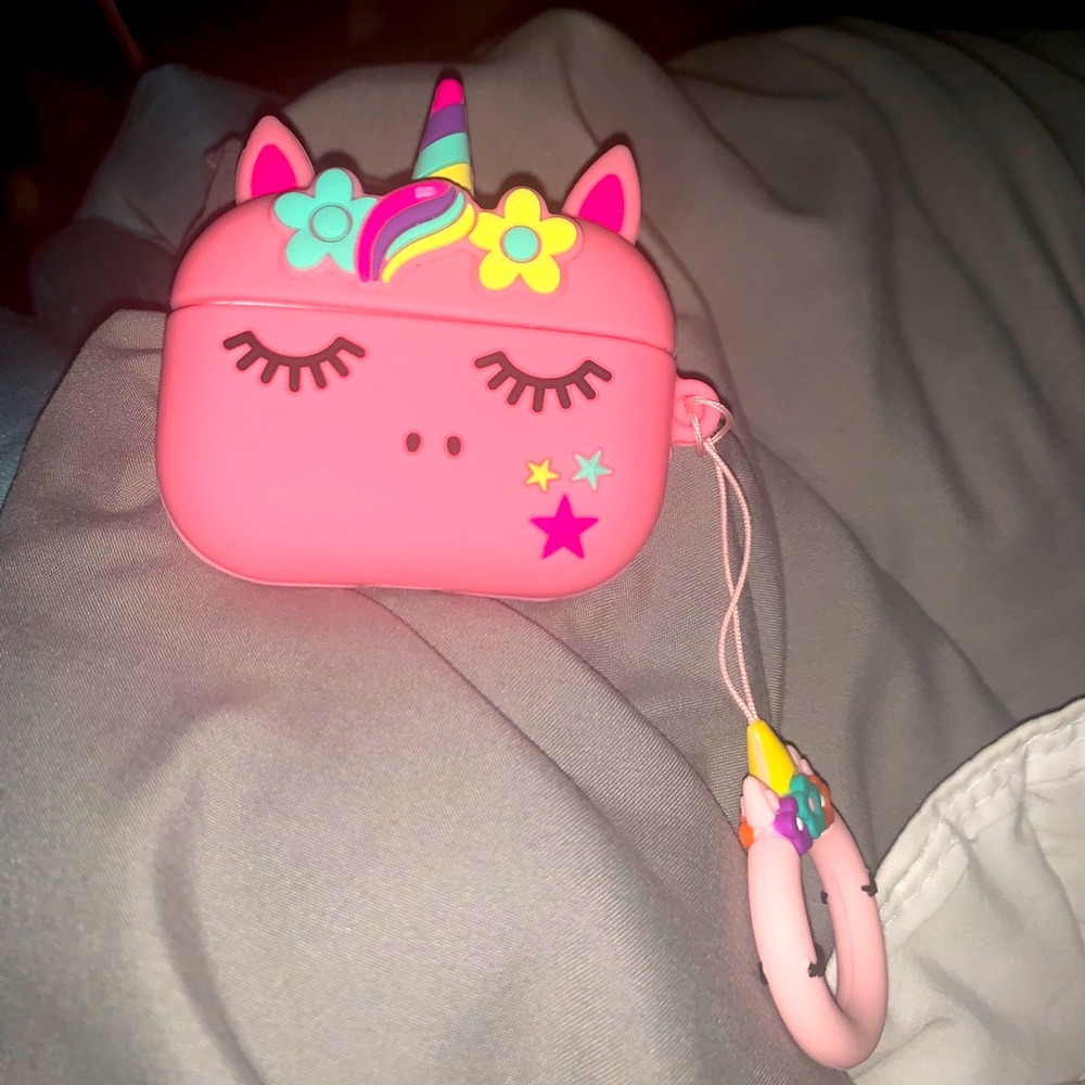 Apple Air Pods Pro with pink unicorn case